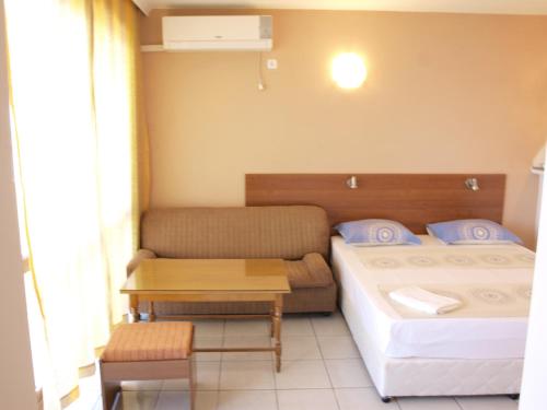 Cama o camas de una habitación en Guestrooms Maria Antoaneta
