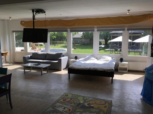 Posezení v ubytování Hestkær Family Rooms