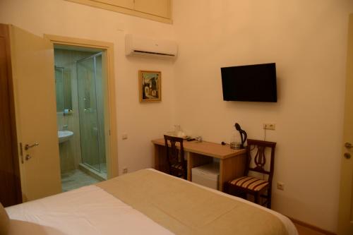 TV a/nebo společenská místnost v ubytování Hotel Varios