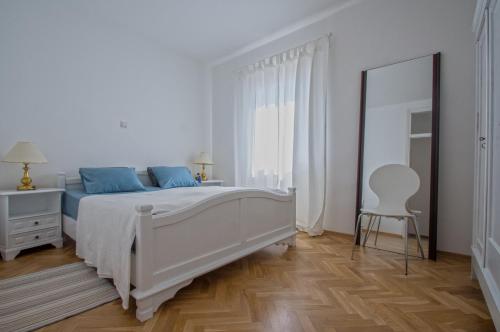 Postel nebo postele na pokoji v ubytování Apartment Ranch