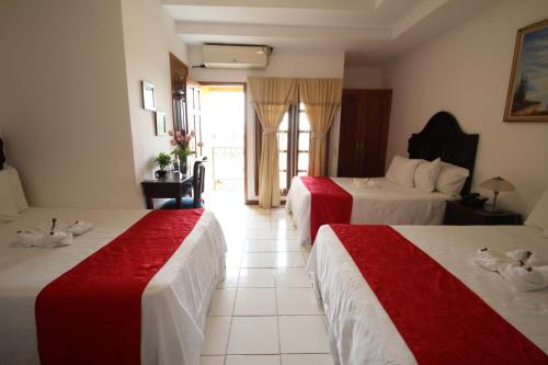 Hotel Los Pinosにあるベッド