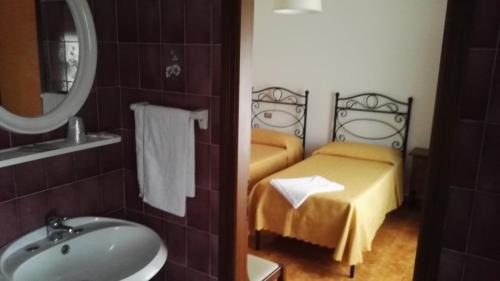 Koupelna v ubytování Hotel La Mimosa