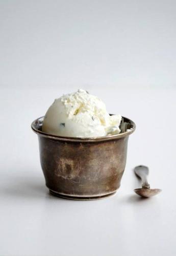 a bowl of vanilla ice cream with a spoon at Hotel Letizia in Orte