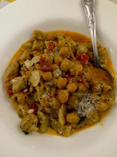 a white plate with a dish of food with a fork at Hotel Letizia in Orte