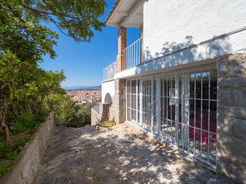 a view of the house from the outside at InmoSantos Casa Tordera in Roses