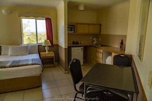 Kuchyň nebo kuchyňský kout v ubytování Ocean International Hotel