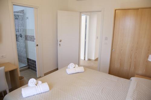 Postel nebo postele na pokoji v ubytování Donna Rosa Accommodation