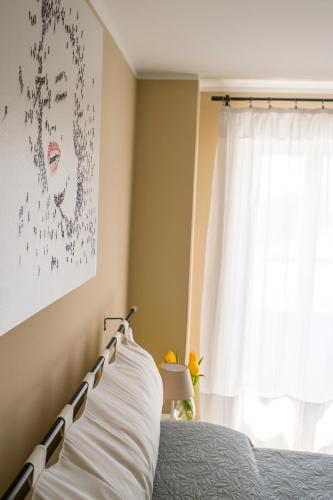 Postel nebo postele na pokoji v ubytování La Fiorana Ivrea