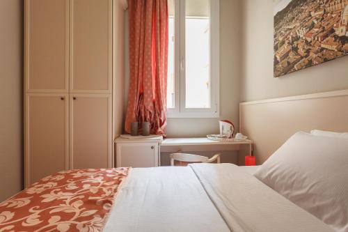 Postel nebo postele na pokoji v ubytování Casa Angelica