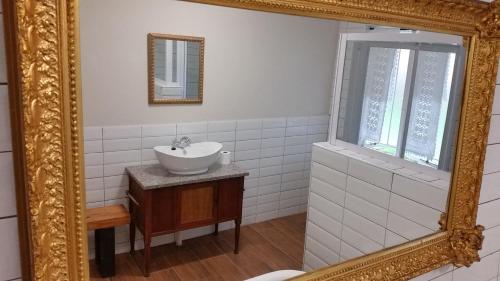Ένα μπάνιο στο Bauhenia Guesthouse