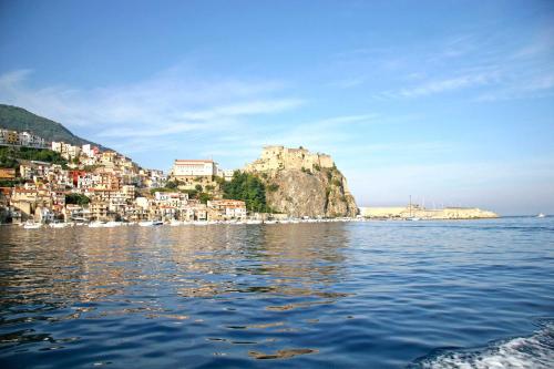 a view of a city from the water at Villa Paladino - B&B e Guest House in Scilla