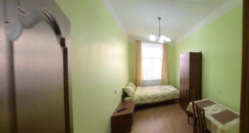 Posteľ alebo postele v izbe v ubytovaní Apartment on Voloshyna