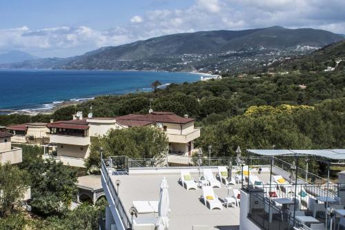 a balcony of a house with a view of the ocean at Hotel Baia in Palinuro
