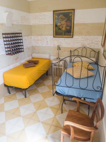 Letto o letti in una camera di Villa delle Agavi Gallipoli