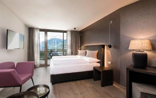 מיטה או מיטות בחדר ב-Hotel - Appartements Schmied Hans