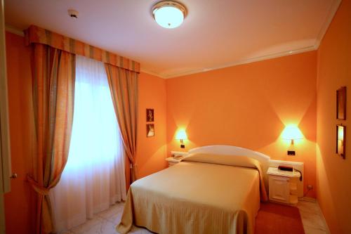 Кровать или кровати в номере Hotel Villa Leri
