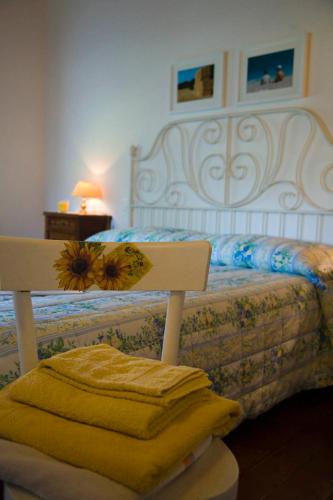 Letto o letti in una camera di B&B Campodisole