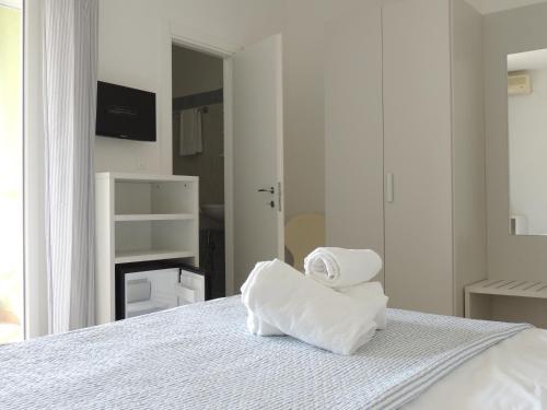 Postel nebo postele na pokoji v ubytování Hotel ai Fiori