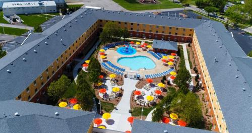 an overhead view of a resort with a swimming pool at Cedar Point's Express Hotel in Sandusky