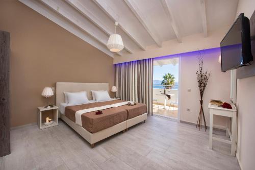 Postel nebo postele na pokoji v ubytování Onar Corfu Aparts & Studios