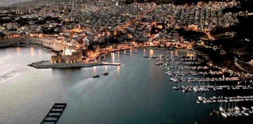 an aerial view of a harbor with boats in the water at BILOCALE VERDI A C/MARE GOLFO in Castellammare del Golfo