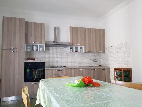 Η κουζίνα ή μικρή κουζίνα στο Casa Vacanza Xenìa
