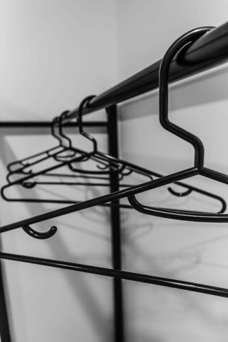 a close up of a black metal rack at Don Muang Hotel in Bangkok