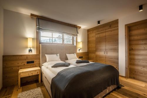Ένα ή περισσότερα κρεβάτια σε δωμάτιο στο Liondes Chalets