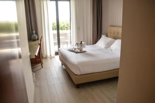 Katil atau katil-katil dalam bilik di Hotel d'Aragona