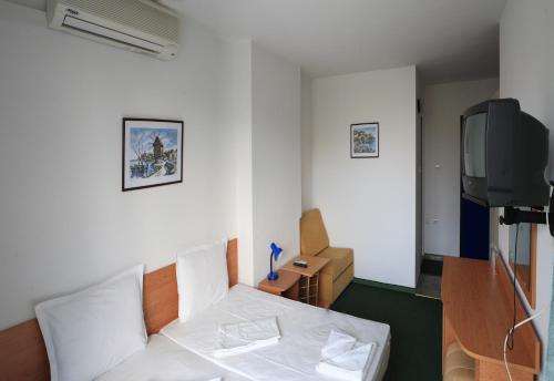 TV a/nebo společenská místnost v ubytování R&G Hotel