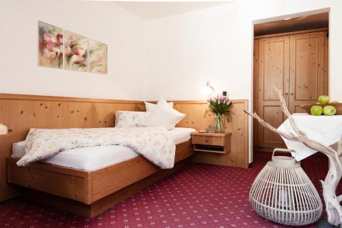 Кровать или кровати в номере Active Hotel Sonne