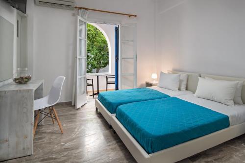 Postel nebo postele na pokoji v ubytování Villa Kavallaris & Apartments