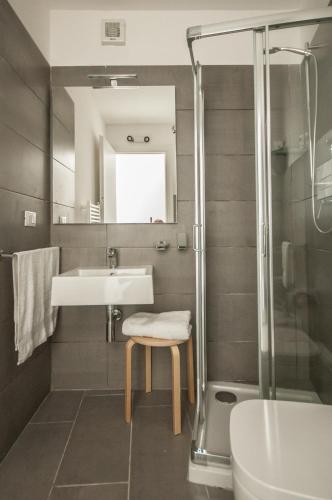 a bathroom with a sink and a shower at B&B Dietro il Teatro in Palermo