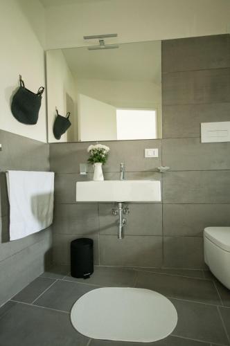 a bathroom with a sink and a toilet at B&B Dietro il Teatro in Palermo