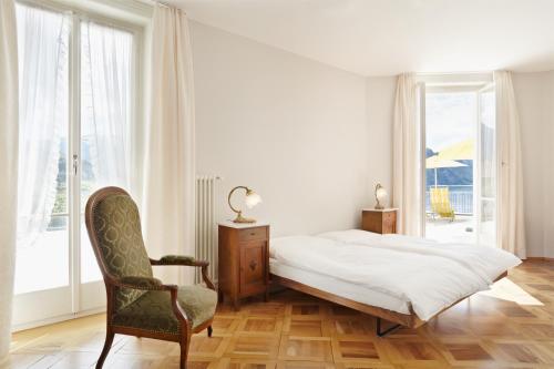 Hotel Terrasse am See tesisinde bir odada yatak veya yataklar
