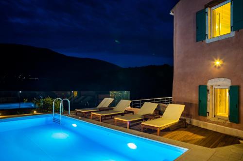 Бассейн в Iconic Villas - Villa Vada или поблизости