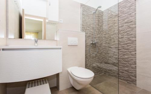 Ванна кімната в Apartments Hrgovcic