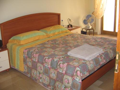 Postel nebo postele na pokoji v ubytování Appartement San Giuseppe