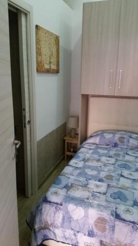 Flaviogioia Apartmentにあるベッド