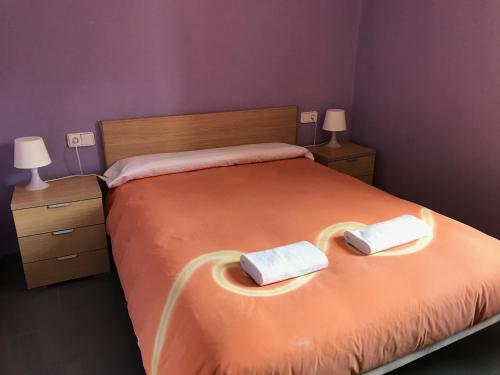 Tempat tidur dalam kamar di El Castellet Fanzara