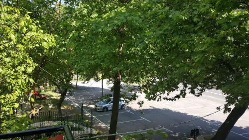 a parking lot with a car parked in it at Hani Zemenou in Arachova