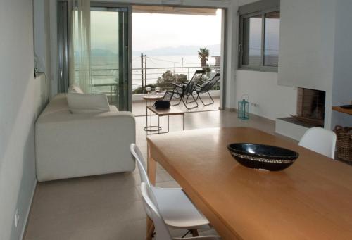 a kitchen with a table with a bowl on top of it at ILIOS H&E house in Elia Laconias