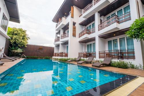 Bazén v ubytování Le Patta Resort & Hotel Chiang Rai nebo v jeho okolí