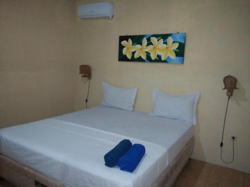 Postel nebo postele na pokoji v ubytování Izzi Homestay