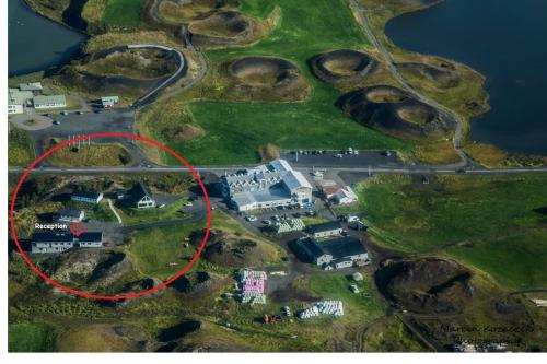 an aerial view of a house with a red circle at Skútustadir Guesthouse in Myvatn