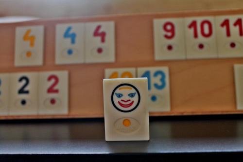 a close up of a table with a clown face on it at Pensiunea Alpina in Malaia