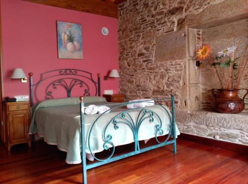 En eller flere senge i et værelse på PICO SACRO II HOTEL Santiago de Compostela