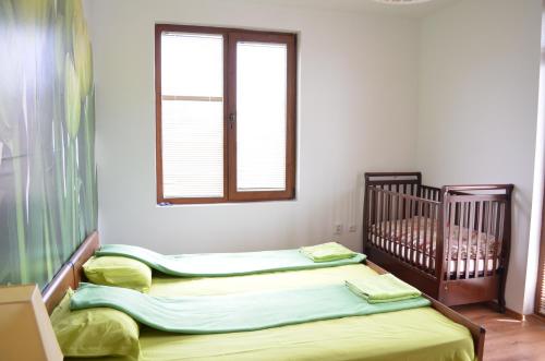 Кровать или кровати в номере ART Apartments - Pomorie