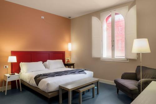 Кровать или кровати в номере Almarossa