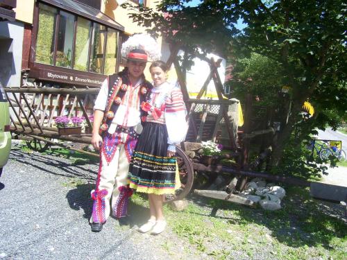 a man and a woman posing for a picture at Goralturist in Ždiar
